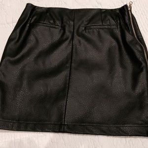 Black faux leather mini skirt